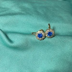 Vintage Coro screwback earrings. Bright blue centre stones with crystal halo